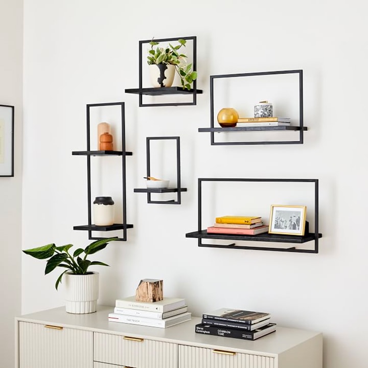 Black steel and wooden wall shelves