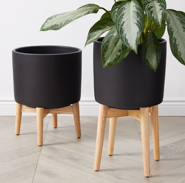Mid-Century black planters with wooden legs