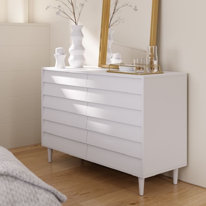 White dresser with overlapping wood panels