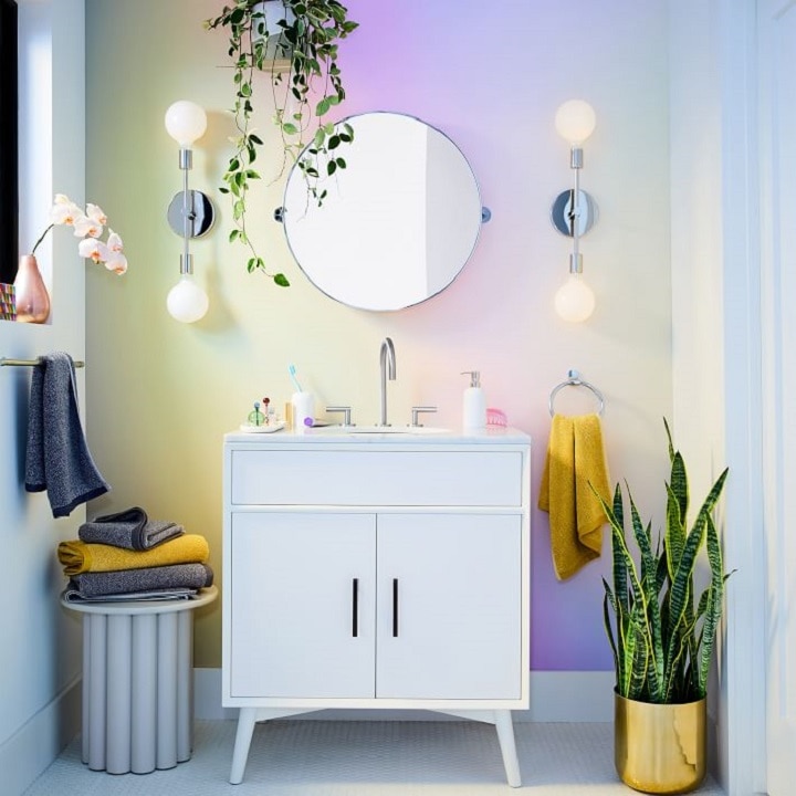 Colorful bathroom with small white vanity