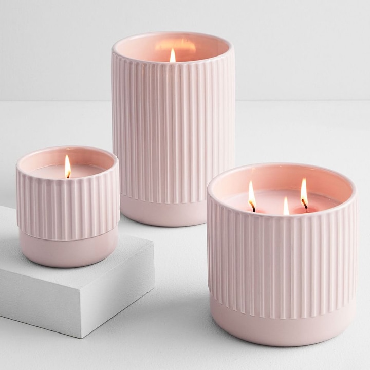 Three fluted pink candles.