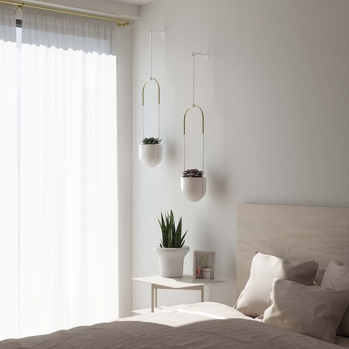 Wall planters in the bedroom.