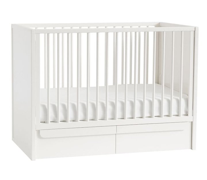 White crib with drawers