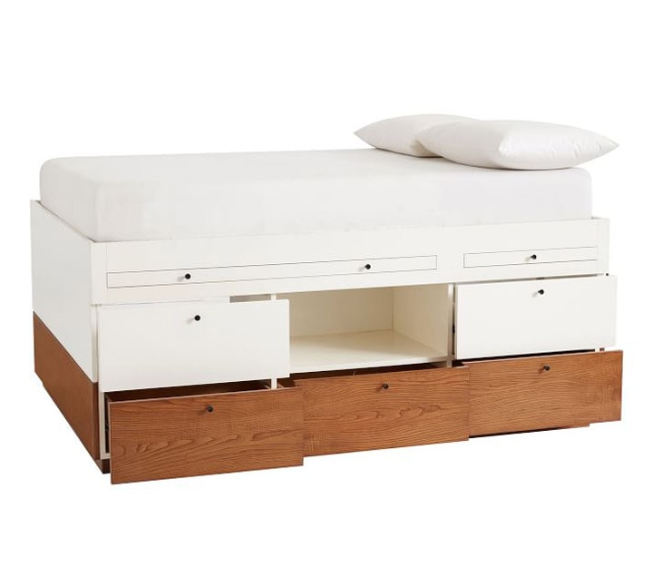 Wooden bed with drawers