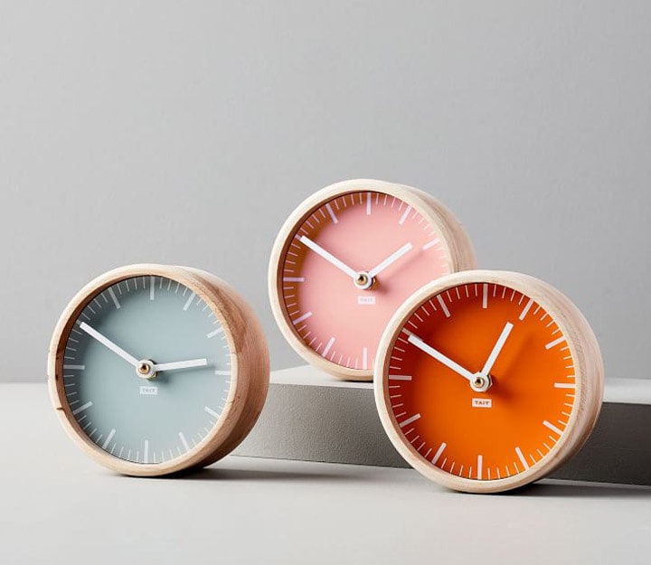 Three multicolored clocks