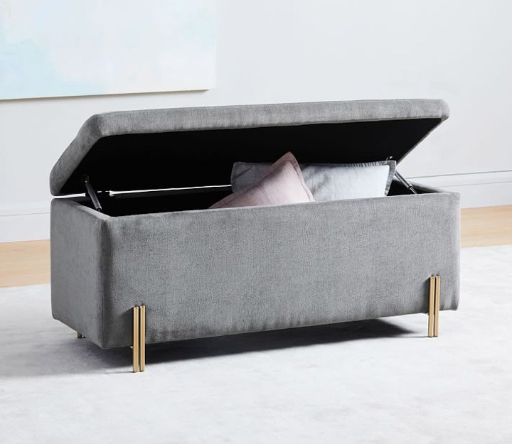 Upholstered storage bench and pillows