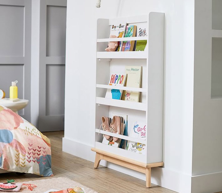 White bookrack with books and shoes