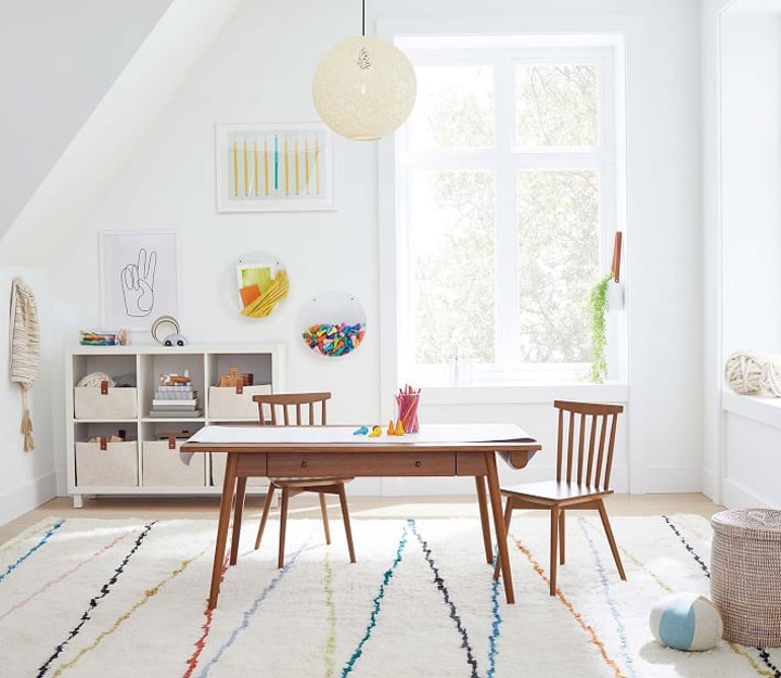 Playroom with table, chairs and toys