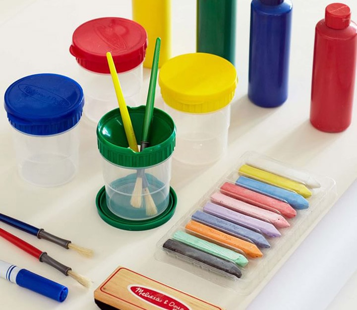 Art supplies with paint and chalk