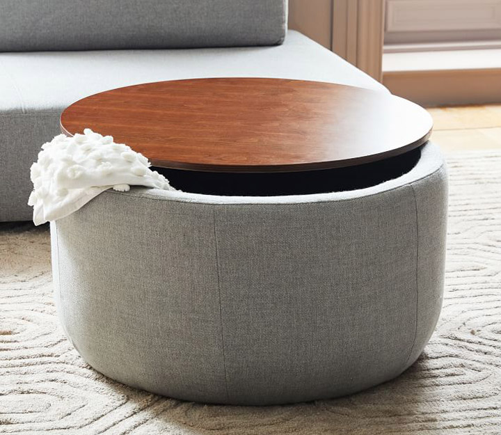 Wood and upholstered storage ottoman
