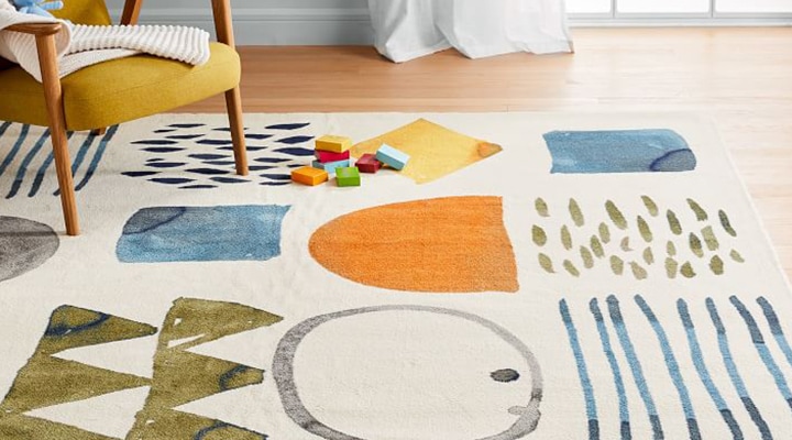 Cream rug with colorful shapes