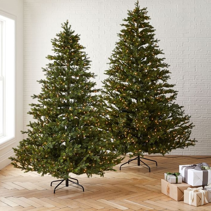 Dazzle holiday guests with an elegant Christmas tree draped with