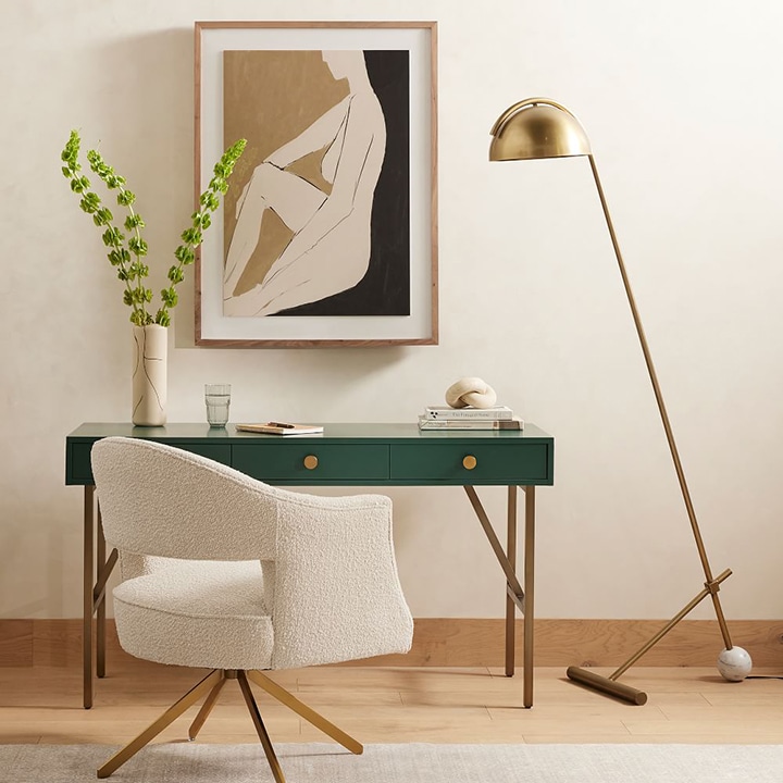 green wood desk with brass knobs