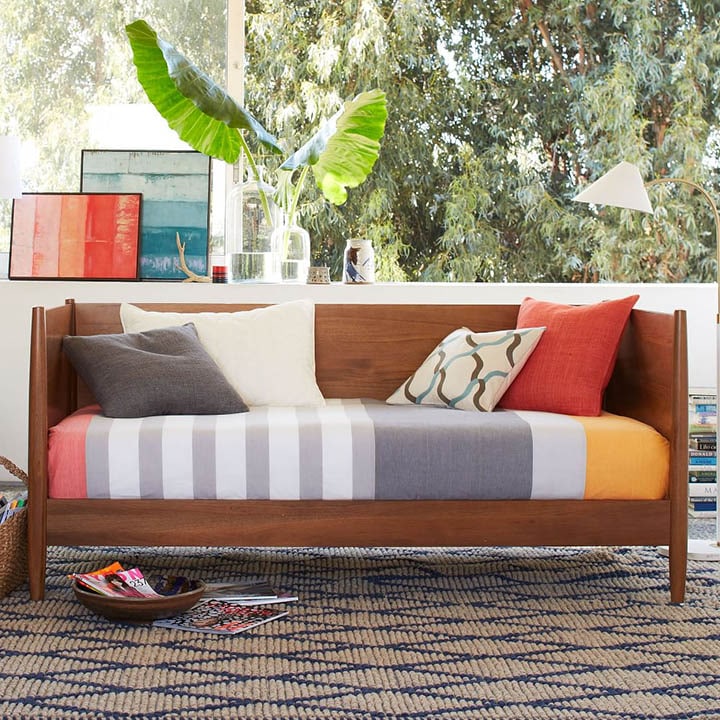 Mid-century daybed with pillows