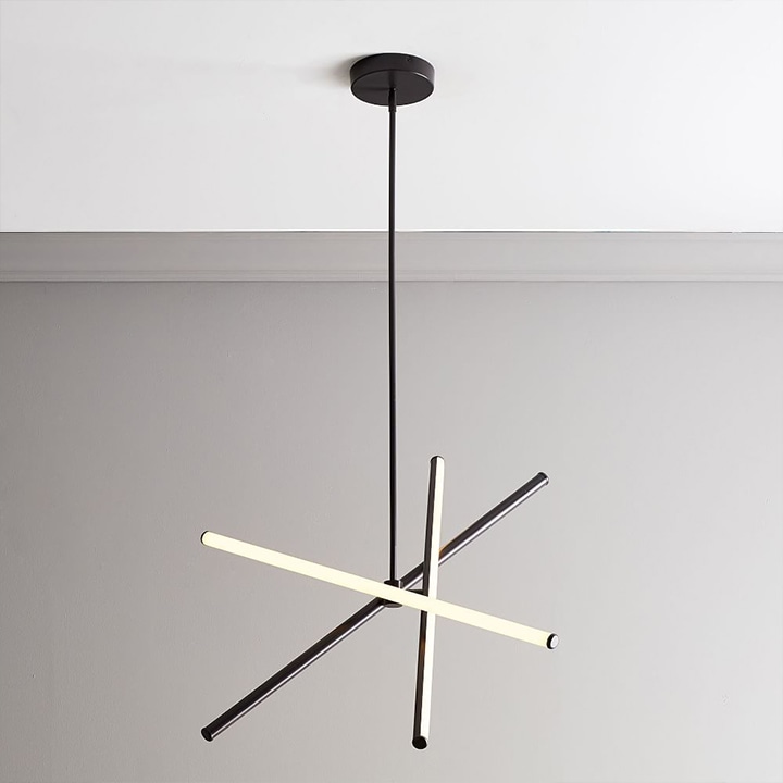 Black LED rod chandelier hanging from ceiling.