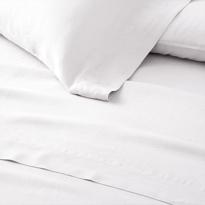 White linen sheets.