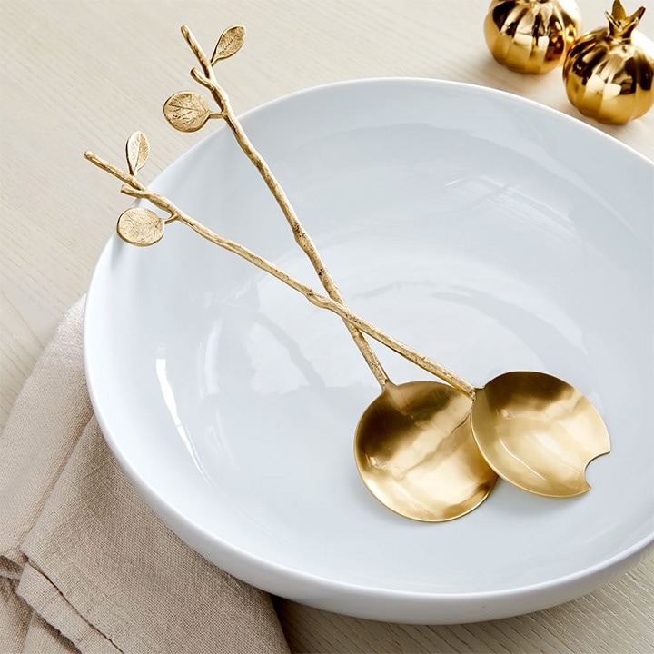 gold utensil set laid out gold utensil set laid out