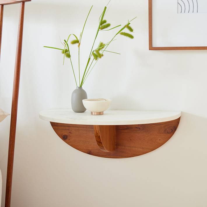 Floating nightstand with outlet top