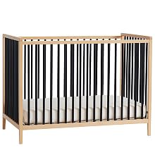 black and natural wood crib