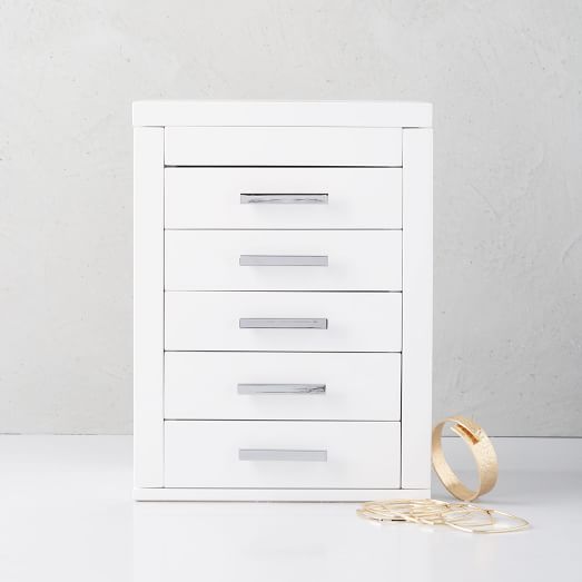 white jewelry box with drawers