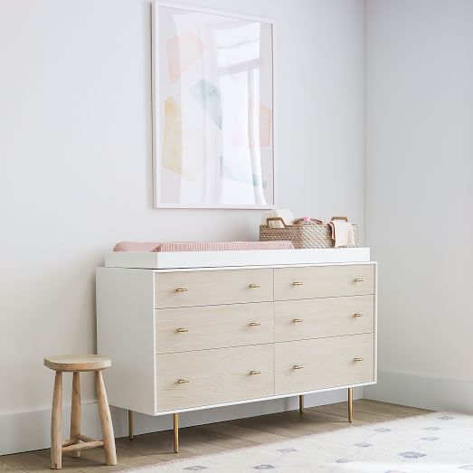 white dresser and changing table