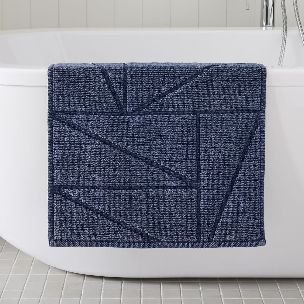 Peppery Home Geometric Bath Mat in navy blue and orange semi