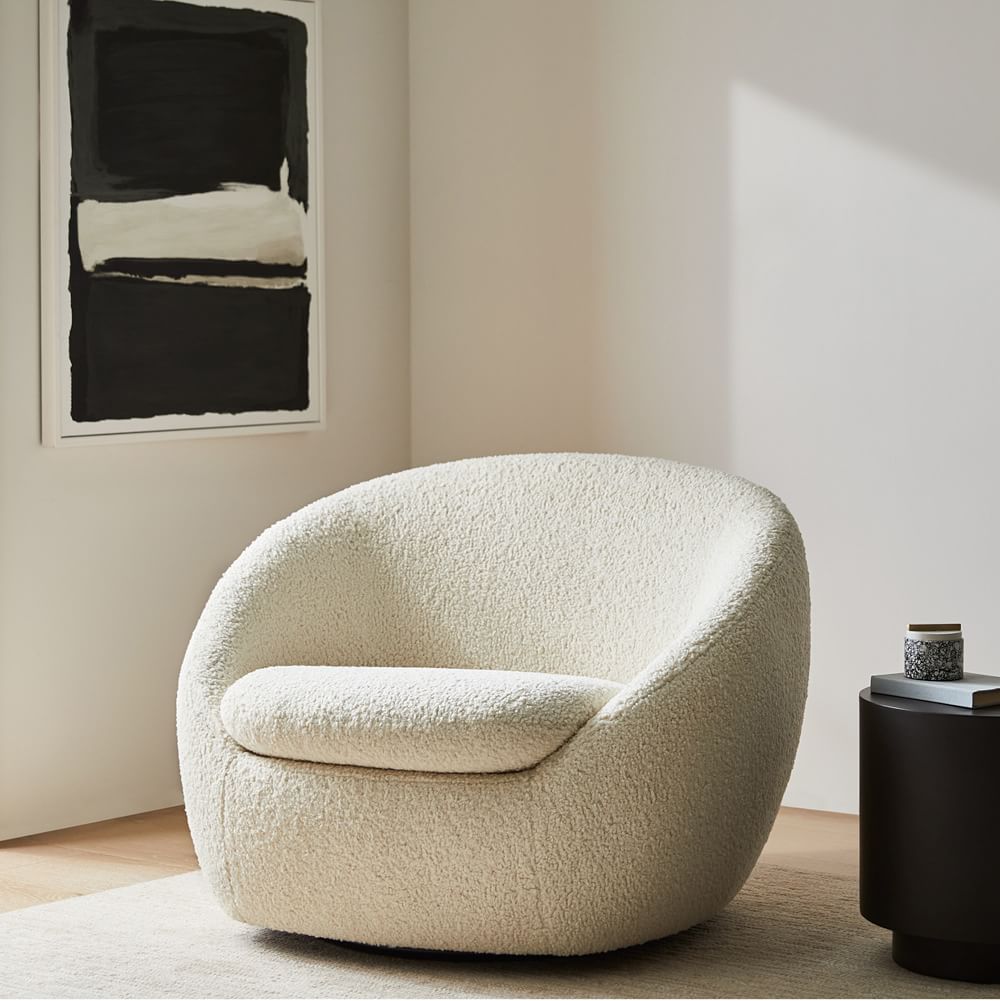 https://assets.weimgs.com/weimgs/ab/images/wcm/products/202137/0405/cozy-swivel-chair-z.jpg