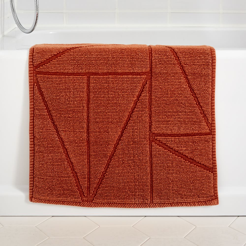 https://assets.weimgs.com/weimgs/ab/images/wcm/products/202139/0002/organic-triangle-sculpted-bath-mat-1-z.jpg