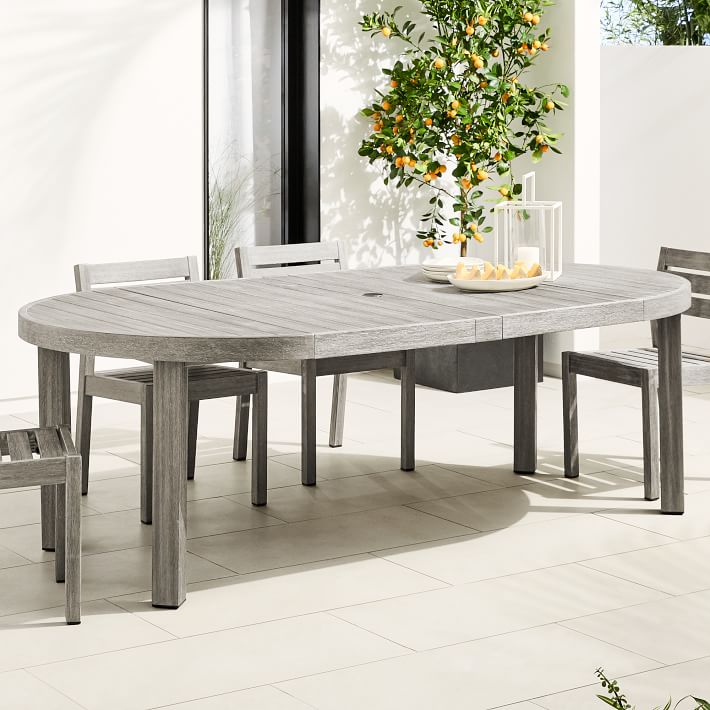 expandable round dining table with chairs