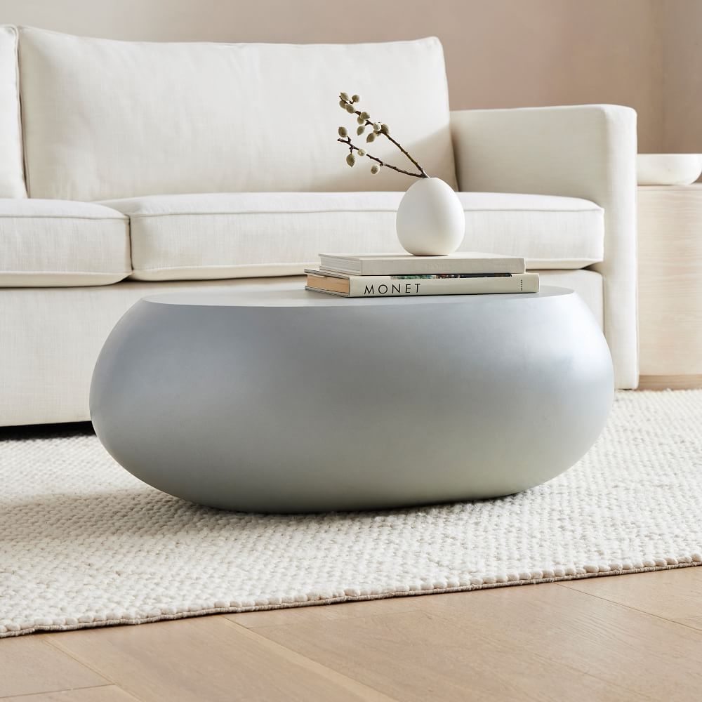 Pebble Indoor/Outdoor Oval Coffee Table (36") West Elm