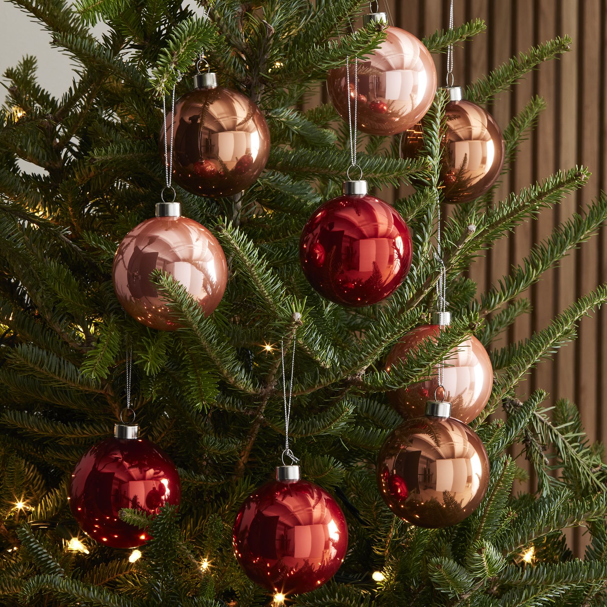 https://assets.weimgs.com/weimgs/ab/images/wcm/products/202235/0159/tonal-blush-glass-boxed-ornaments-set-of-9-xl.jpg