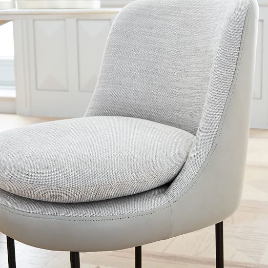 modern curved upholstered dining chair