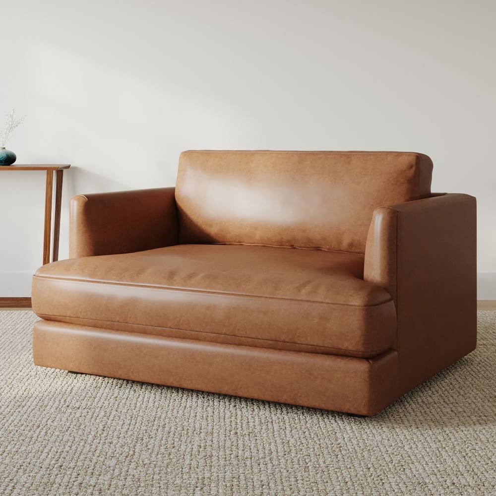 brown leather chair and a half