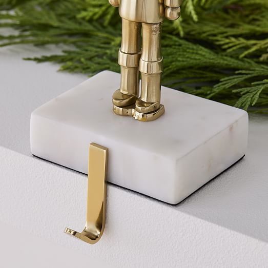 Brass & Marble Nutcracker Stocking Holder West Elm