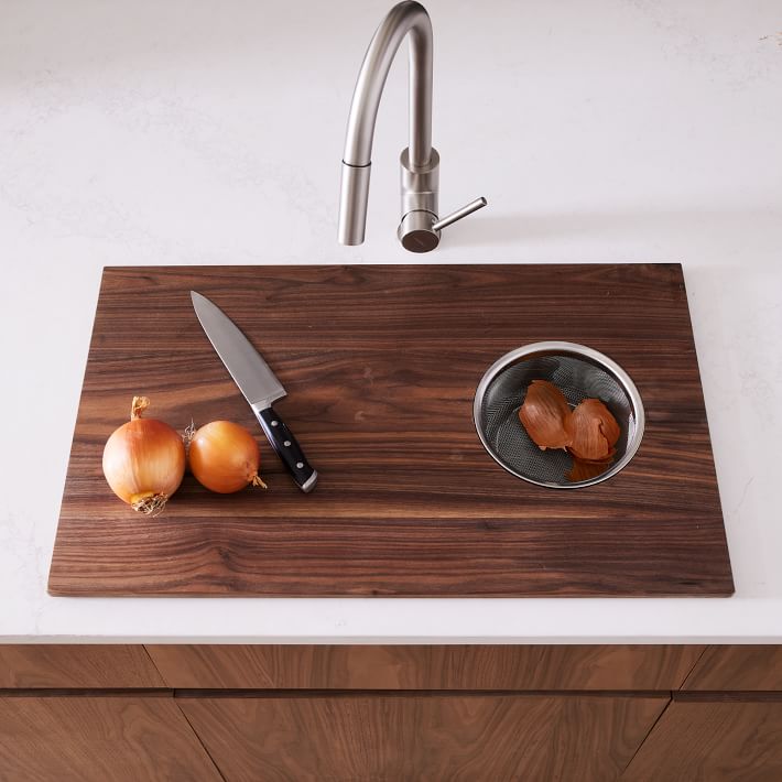 https://assets.weimgs.com/weimgs/ab/images/wcm/products/202329/0026/stonewon-designs-co-over-the-sink-cutting-board-o.jpg