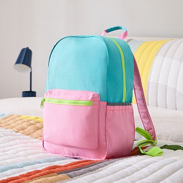 https://assets.weimgs.com/weimgs/ab/images/wcm/products/202332/0109/open-box-astor-backpack-pink-teal-m.jpg