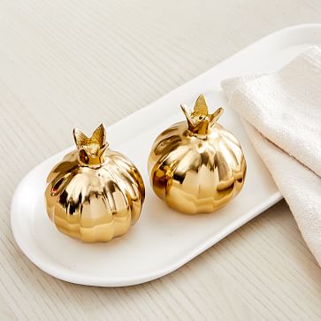 https://assets.weimgs.com/weimgs/ab/images/wcm/products/202337/0057/pomegranate-salt-pepper-shakers-set-of-2-m.jpg