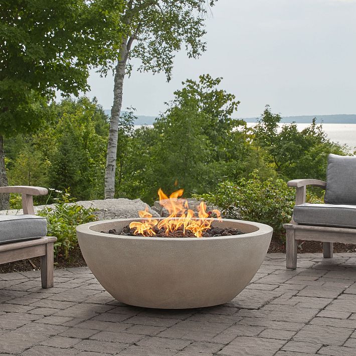 https://assets.weimgs.com/weimgs/ab/images/wcm/products/202337/0067/round-concrete-fire-pit-table-38-42-o.jpg