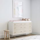 White changing outlet table with drawers