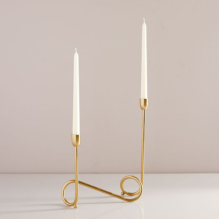 https://assets.weimgs.com/weimgs/ab/images/wcm/products/202342/0065/loop-polished-brass-candelabra-o.jpg
