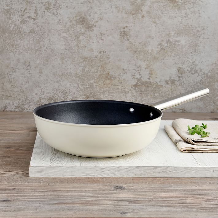 https://assets.weimgs.com/weimgs/ab/images/wcm/products/202343/0090/smeg-nonstick-wok-o.jpg