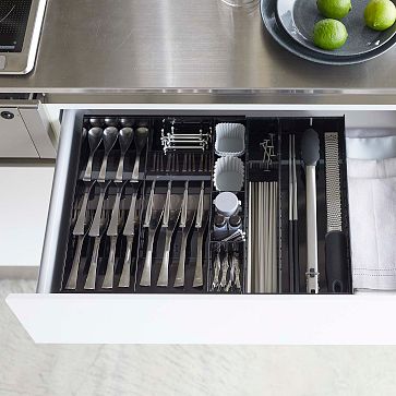 https://assets.weimgs.com/weimgs/ab/images/wcm/products/202346/0087/yamazaki-tower-expandable-cutlery-drawer-organizer-m.jpg