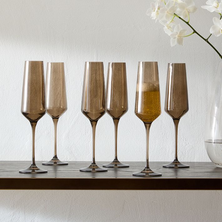 https://assets.weimgs.com/weimgs/ab/images/wcm/products/202347/0025/estelle-colored-glass-champagne-flute-set-of-6-o.jpg