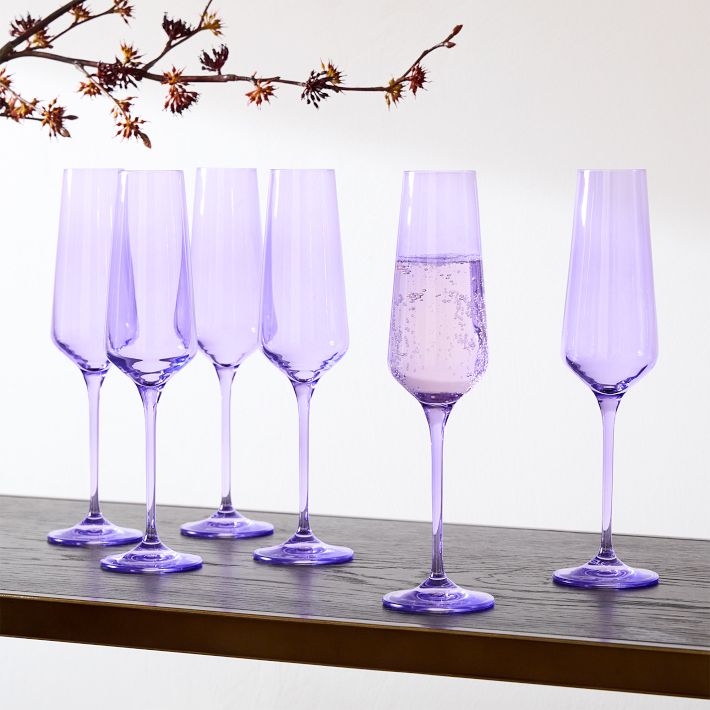 https://assets.weimgs.com/weimgs/ab/images/wcm/products/202347/0044/estelle-colored-glass-champagne-flute-set-of-6-o.jpg
