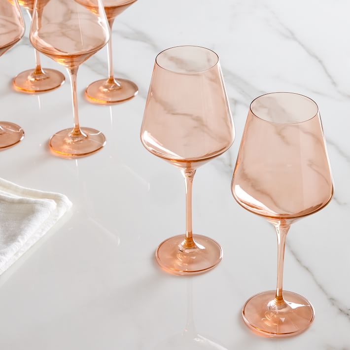 https://assets.weimgs.com/weimgs/ab/images/wcm/products/202349/0004/estelle-colored-glass-stemmed-wine-glass-set-of-6-o.jpg