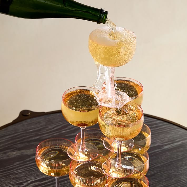 https://assets.weimgs.com/weimgs/ab/images/wcm/products/202351/0023/esme-champagne-tower-set-of-12-o.jpg