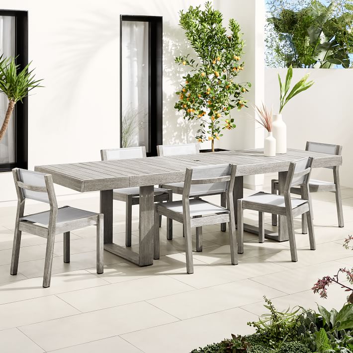 Retractable outdoor dining online table