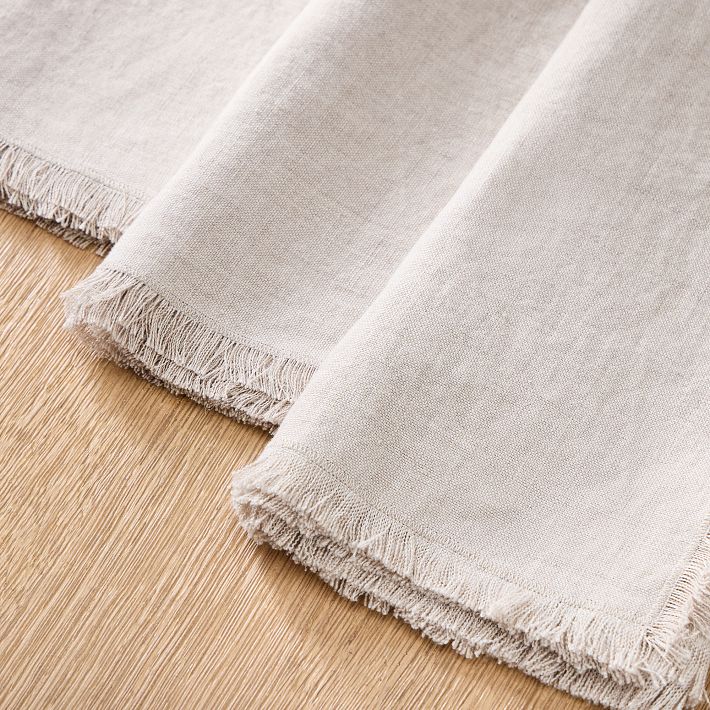 https://assets.weimgs.com/weimgs/ab/images/wcm/products/202410/0025/frayed-edge-linen-napkin-sets-o.jpg