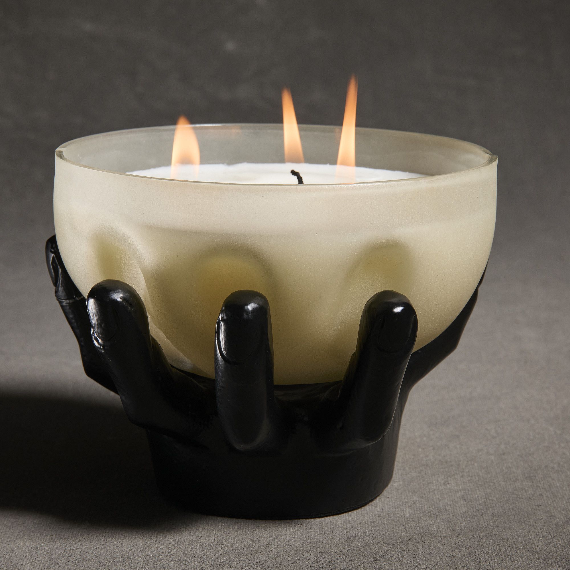 Spooky Hand Filled Glass Candles | West Elm