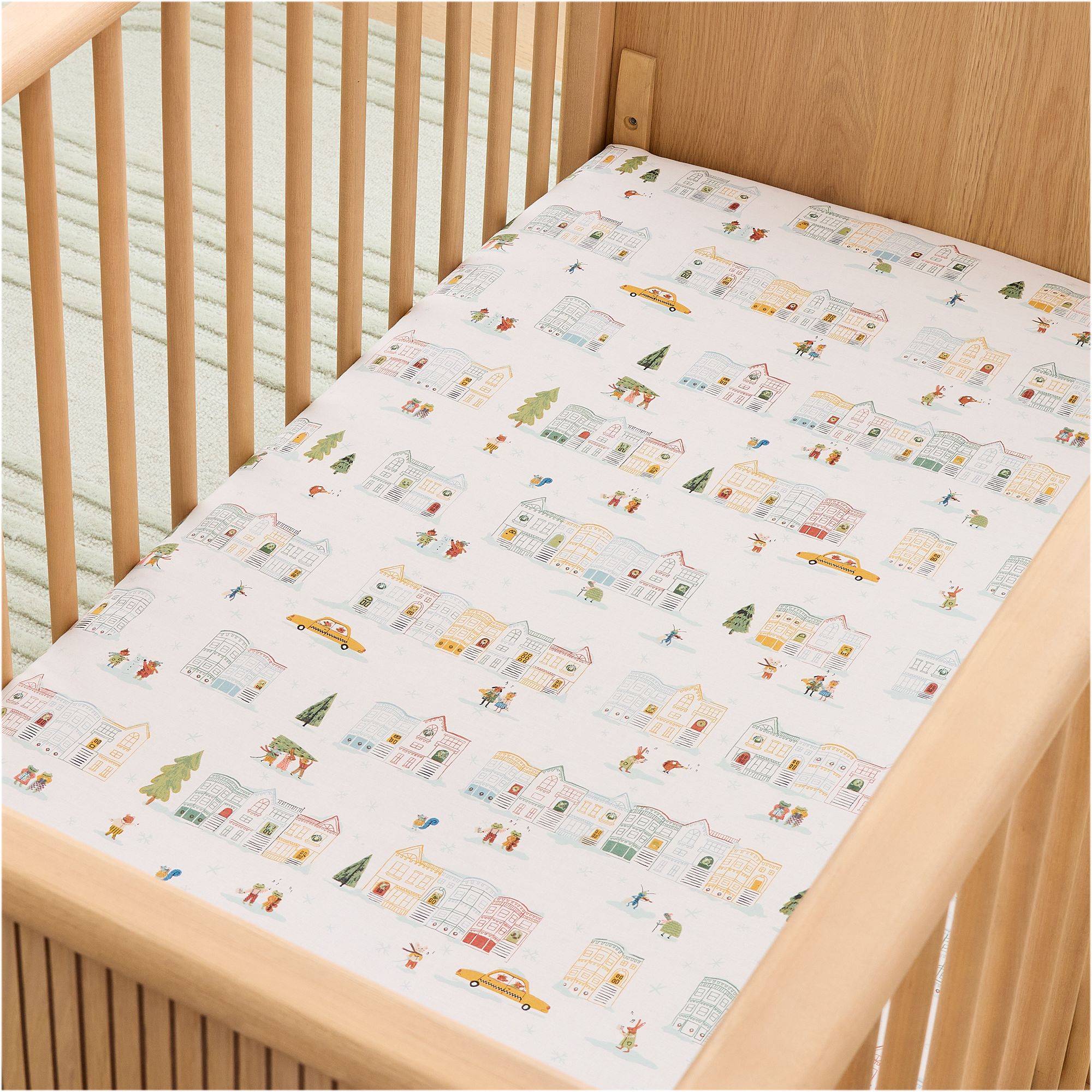 Festive Friends City Scene Crib Fitted Sheet | West Elm